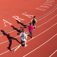 students running on track