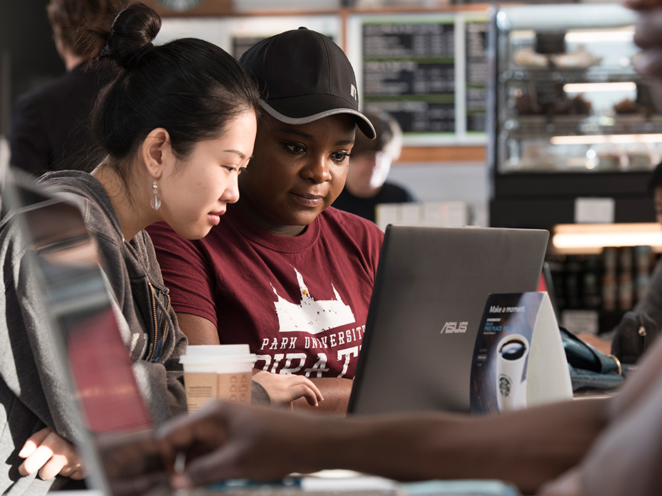 two students at laptop