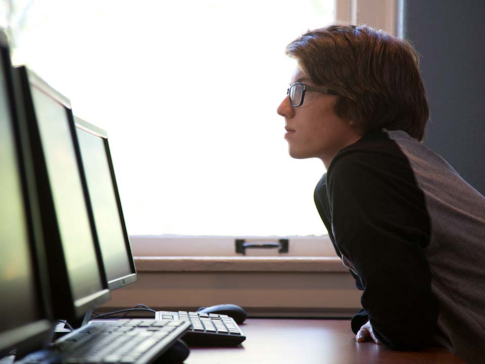 student at computer