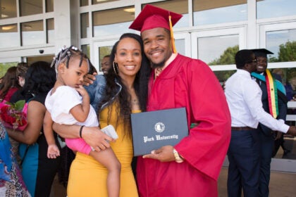 student with diploma