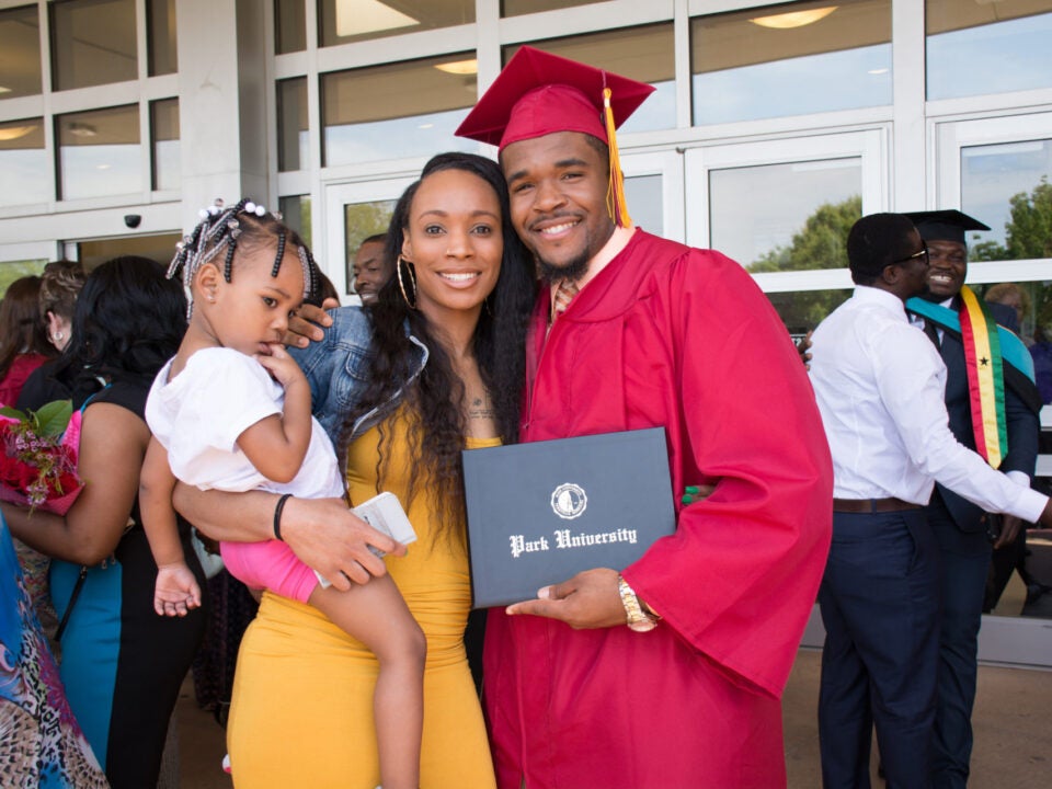 student with diploma