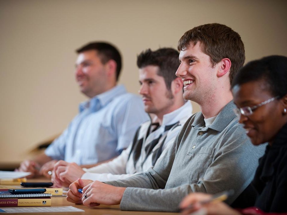 students at table in class