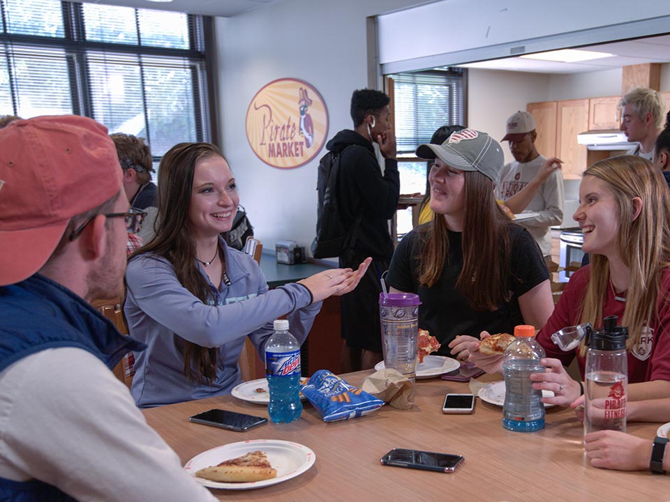 students around table