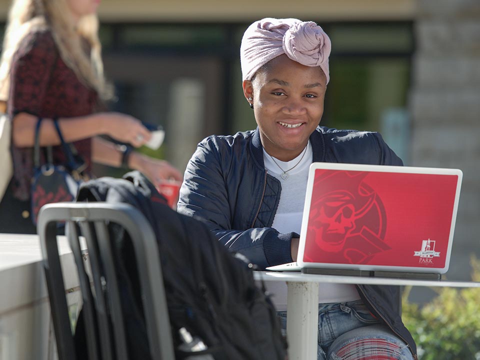female student with laptop