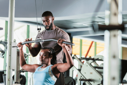 trainers in gym working out