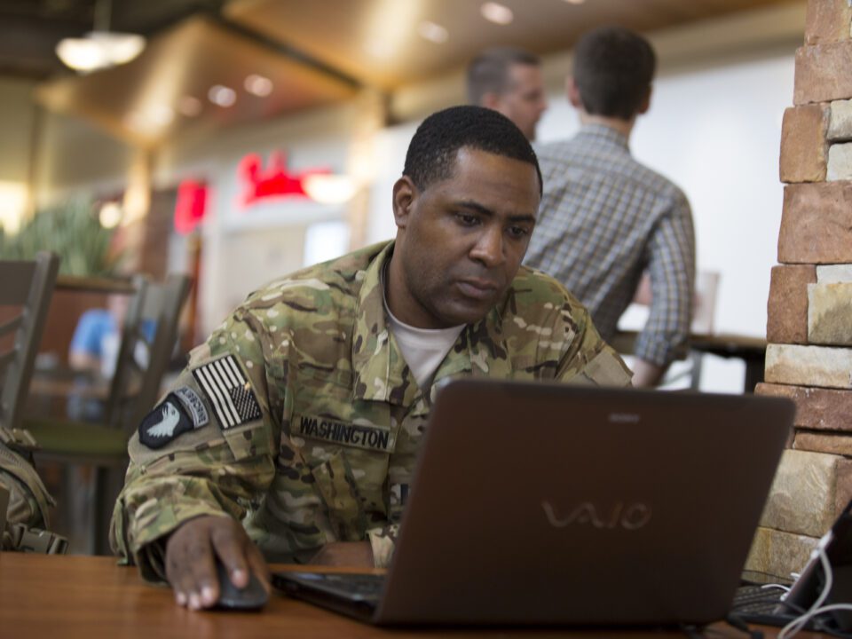 military student on laptop