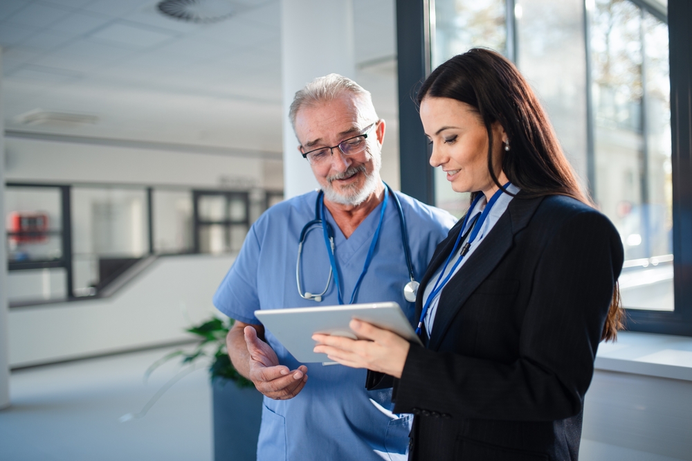 Health Administrator Talking With Nurse -Park University