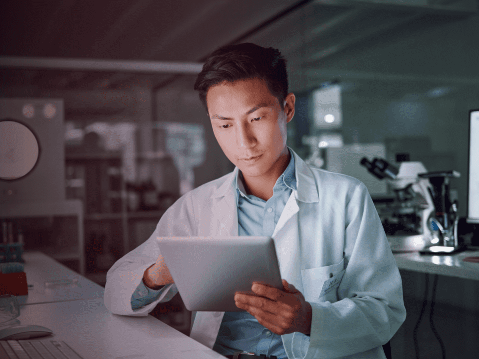 healthcare professional looking at tablet