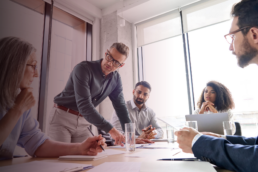workplace leader speaking with employees